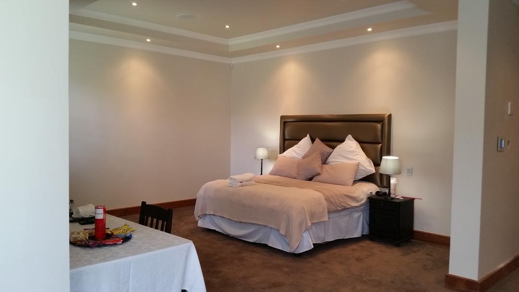 6 On Acacia Bed & Breakfast โจฮันเนสเบิร์ก ห้อง รูปภาพ